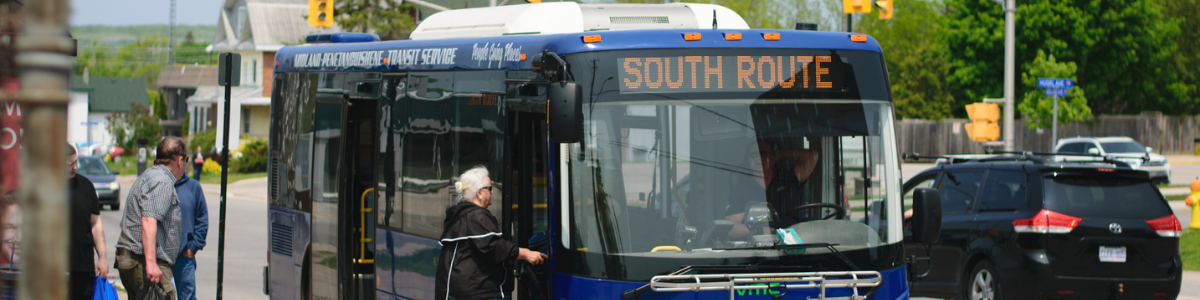 person stepping onto bus